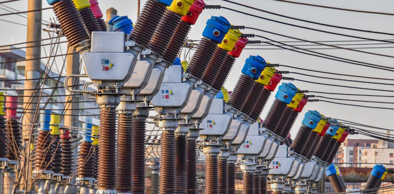Colorful electrical transformers at an outdoor power station